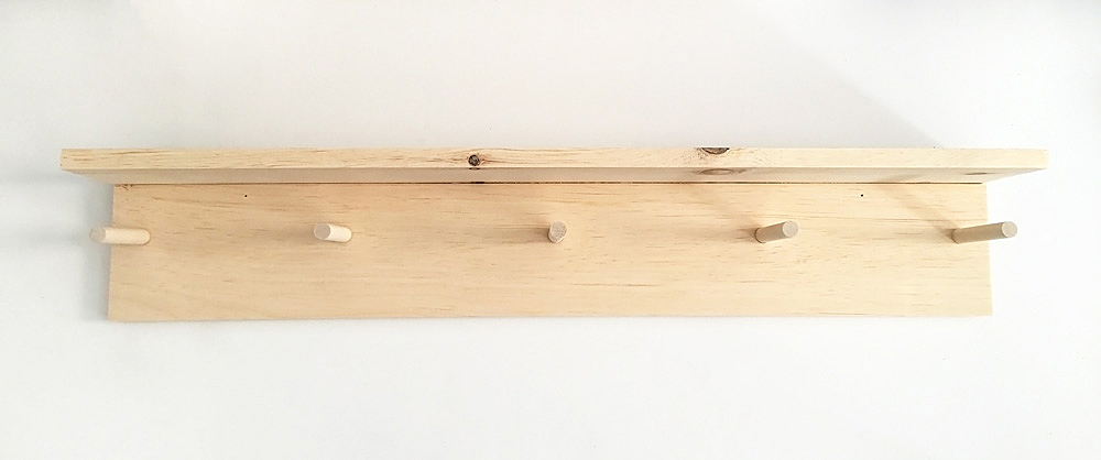 This minimal DIY entryway coat rack is simple to make with a power drill and just a few supplies.