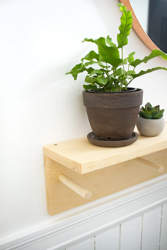 This minimal DIY entryway coat rack is simple to make with a power drill and just a few supplies.