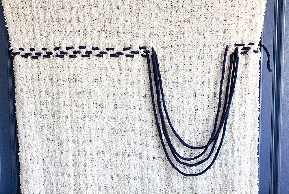DIY Wall Weaving Hack - Make this super easy faux weaving using a blanket!