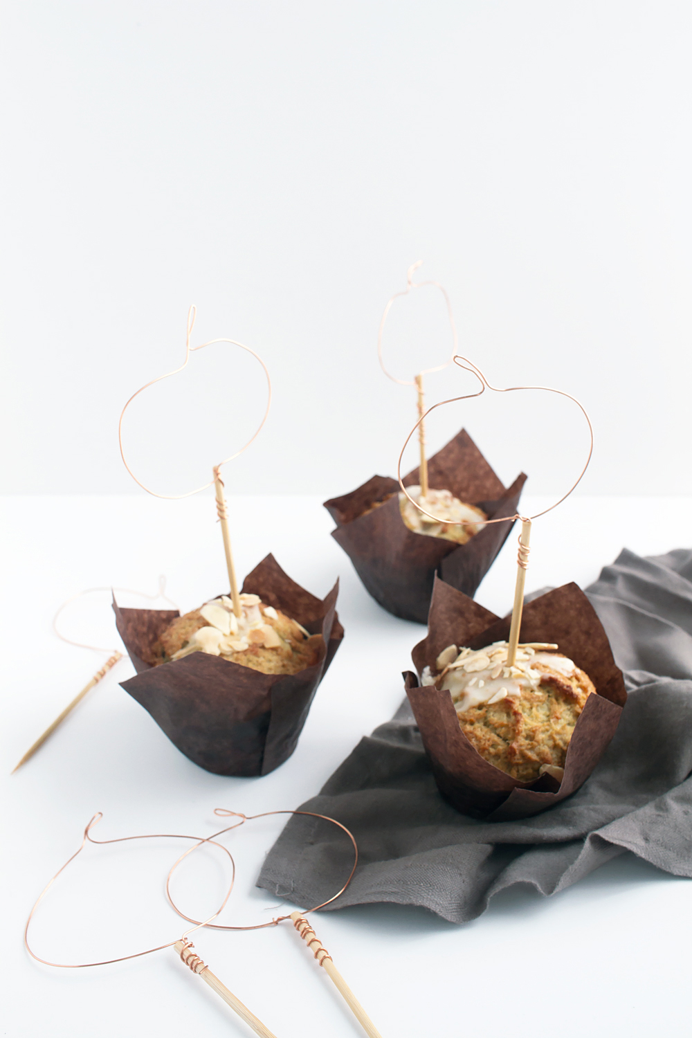 These DIY Wire Pumpkin Cupcake Toppers come together fast in just 4 steps with 2 materials, so you can get back to what's important: eating cupcakes.