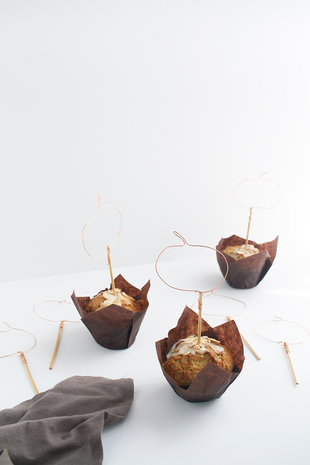 These DIY Wire Pumpkin Cupcake Toppers come together fast in just 4 steps with 2 materials, so you can get back to what's important: eating cupcakes.