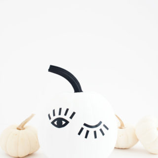 You can make this DIY winking eye pumpkin in just 30 minutes using black contact paper and a free printable template!